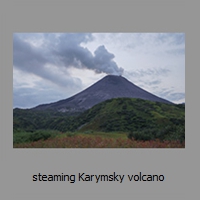 steaming Karymsky volcano